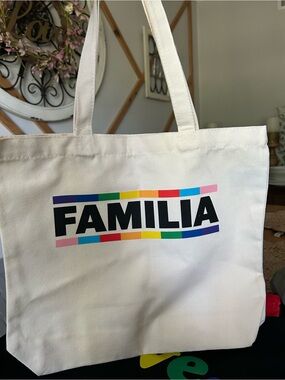 FAMILIA White Canvas Tote with Rainbow Accent. With matching button.